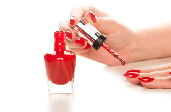 Female Hand Red Nail Polish Bottle — Stock Photo, Image