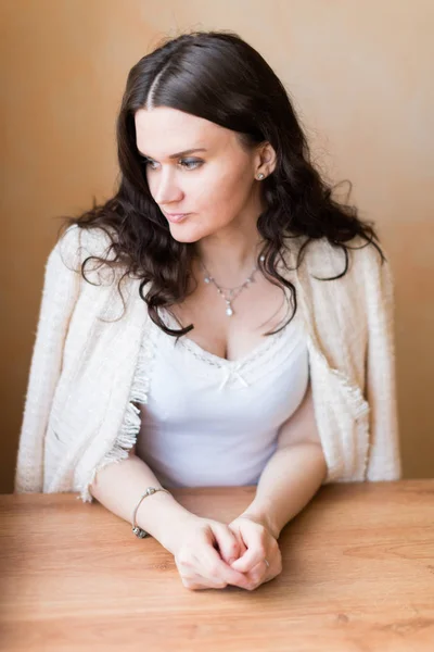 Woman thinking and looking sideways — Stock Photo, Image