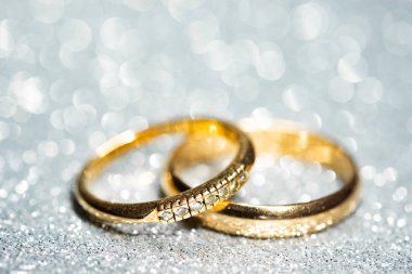 Altın alyanslar. Glitter arka plan