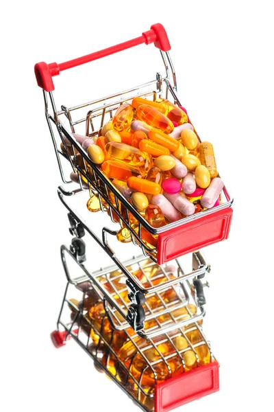 Carrinho de compras com pílulas e medicamentos — Fotografia de Stock