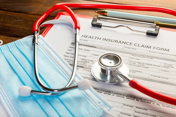 Health Insurance Claim Form Stethoscope Surgical Mask — Stock Photo, Image