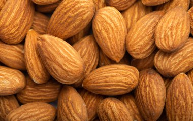 Büyük soyulmuş bademlerin arka planı