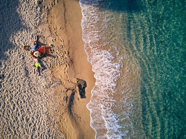 Beautiful beach with family top view shot — Stock Photo, Image