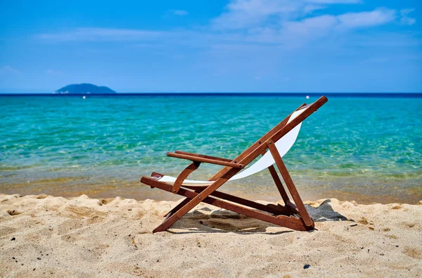 Beautiful beach with lounger chair — Stock Photo, Image