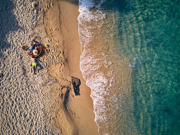 Beautiful beach with family top view shot — Stock Photo, Image