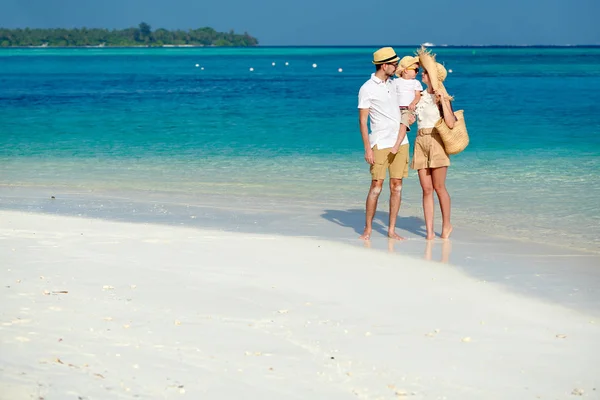 Family with three year old boy on beach — Stock Photo, Image