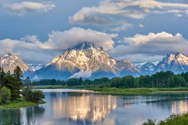 Mountains in Grand Teton National Park at morning. Oxbow Bend on the Snake River. clipart