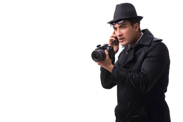 Spy with camera taking pictures isolated on white — Stock Photo, Image