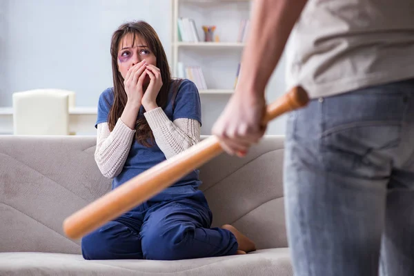 Desparate wife with aggressive husband in domestic violence conc — Stock Photo, Image