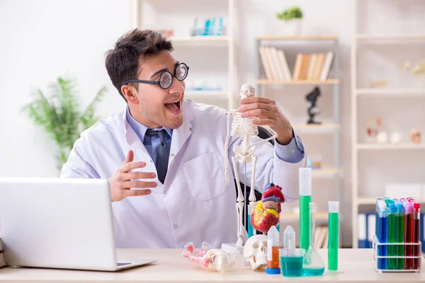 Funny doctor having fun in hospital lab — Stock Photo, Image