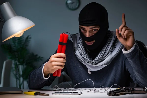 Terrorist bomber preparing dynamite bomb — Stock Photo, Image