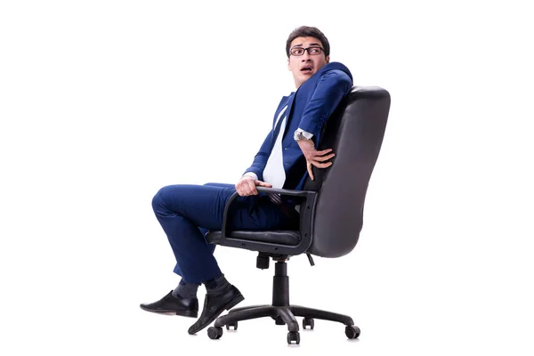 Podnikatel, sedět na kancelářské židli izolované na bílém — Stock fotografie