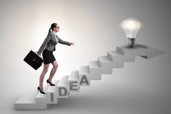 Concept of idea with businesswoman climbing steps stairs — Stock Photo, Image