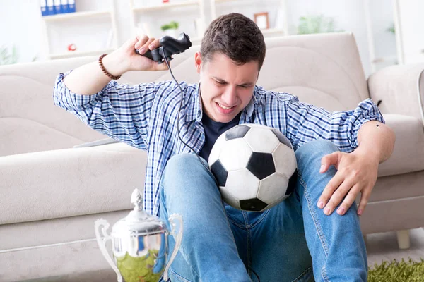 Young man playing computer games at home — Stock Photo, Image
