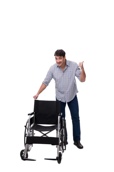 Verzorger met rolstoel geïsoleerd op wit — Stockfoto