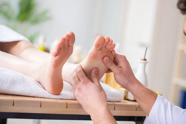 Foot massage in medical spa — Stock Photo, Image