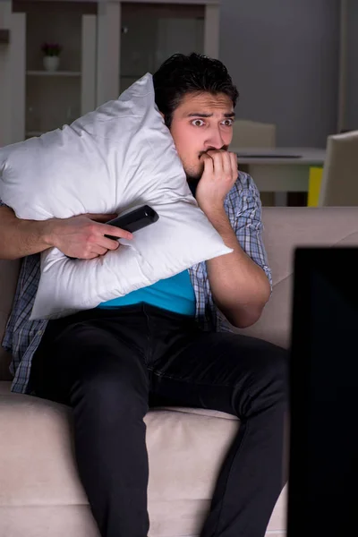 Young man watching tv late at night — Stock Photo, Image