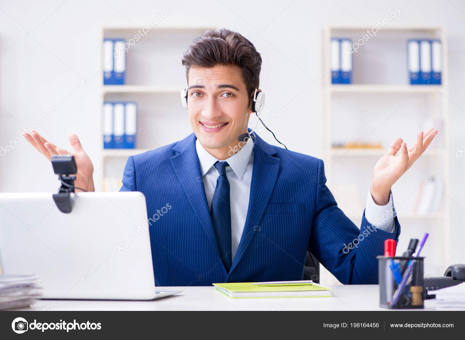 Young Help Desk Operator Working In Office Stock Photo C Elnur
