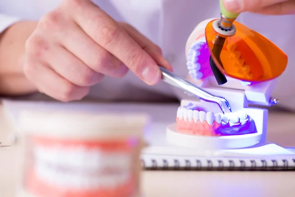 Dentist working teeth implant in medical lab — Stock Photo, Image