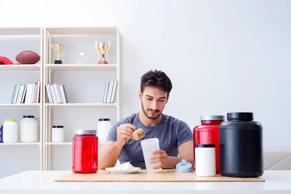 Athlete tasting new protein supplements for better muscles