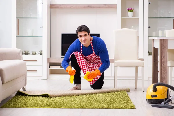 Contractor man cleaning house doing chores — Stock Photo, Image