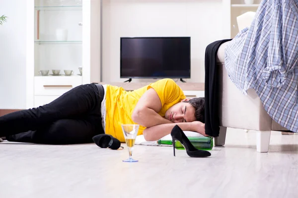 Man with mess at home after house party — Stock Photo, Image