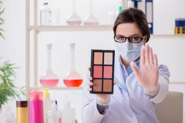 Lab chemist checking beauty and make-up products