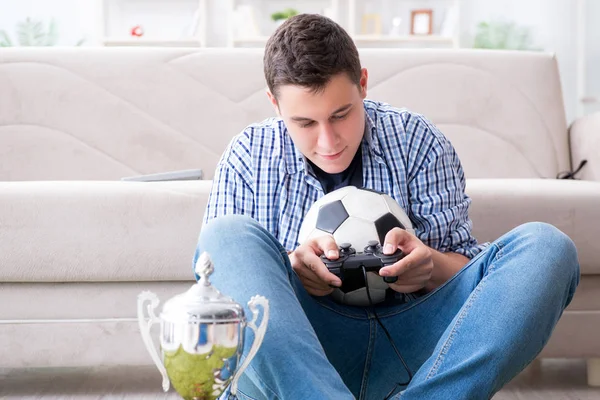 Young man playing computer games at home — Stock Photo, Image