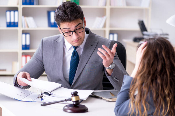 Lawyer discussing legal case with client