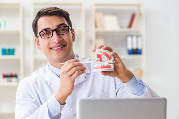 Young dentist working in the dentistry hospital