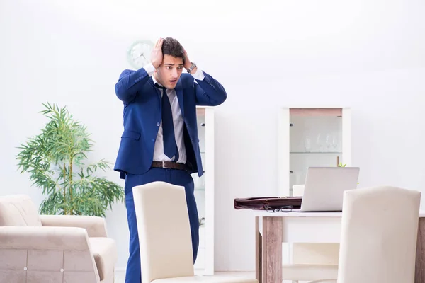 Bankrupt businessman angry and upset at home — Stock Photo, Image