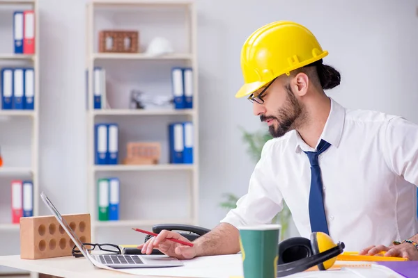 Architect working in his studio on new project — Stock Photo, Image