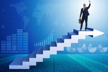 İş adamı iş dünyasında kariyer basamaklarını tırmanıyor