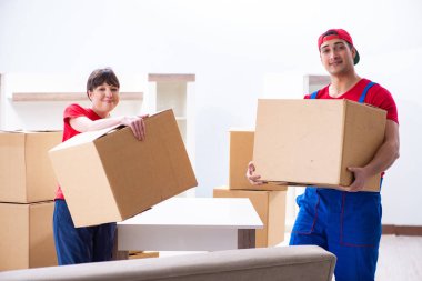 Professional movers doing home relocation clipart