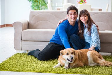 Happy family with golden retriever dog clipart