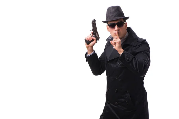 Человек шпион с пистолетом изолированы на белом фоне — стоковое фото