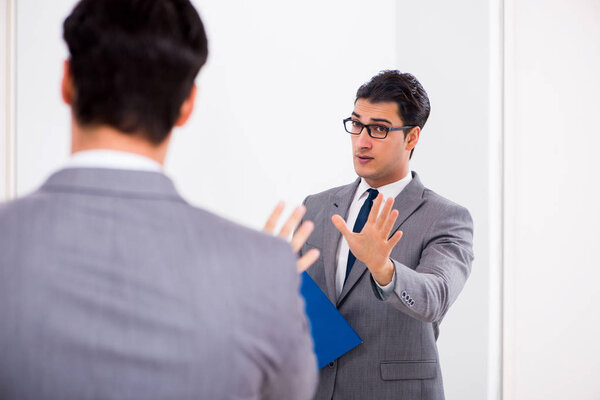 Politician planning speach in front of mirror