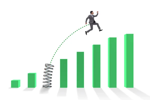 Pessoas de negócios pulando sobre gráficos de barras — Fotografia de Stock
