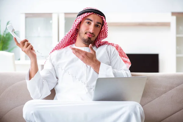 Arab man working at home on his work — Stock Photo, Image