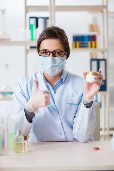 Lab chemist checking beauty and make-up products