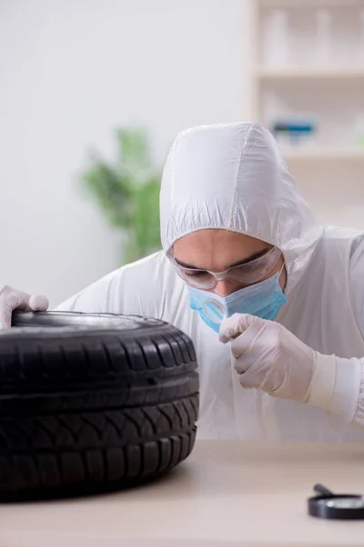 Expert is looking at car accident evidence