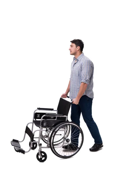 Caregiver with wheelchair isolated on white — Stock Photo, Image