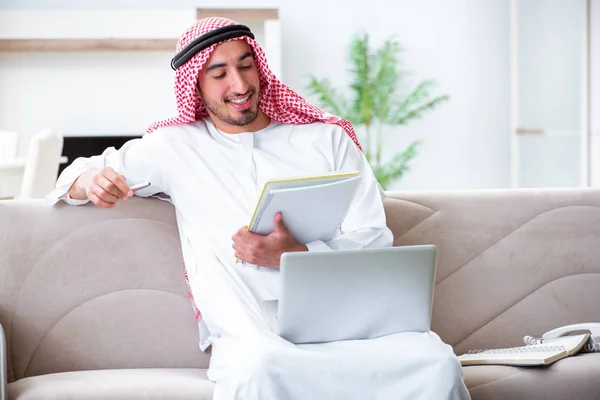 Arab man working at home on his work — Stock Photo, Image