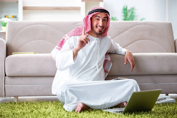 Arab man working at home on his work