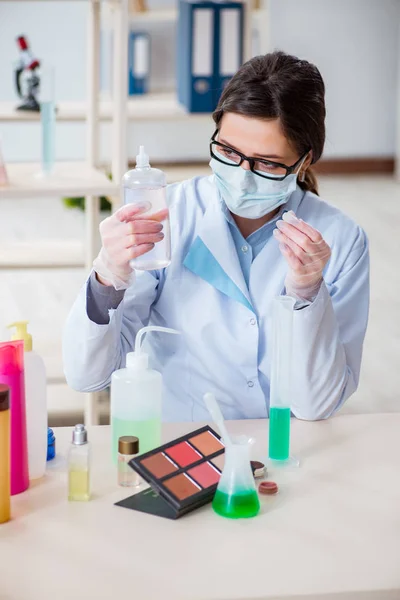 Lab chemist checking beauty and make-up products