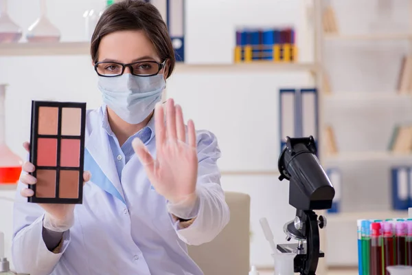 Lab chemist checking beauty and make-up products