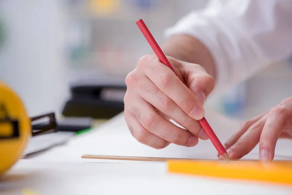 Architect working in his studio on new project — Stock Photo, Image