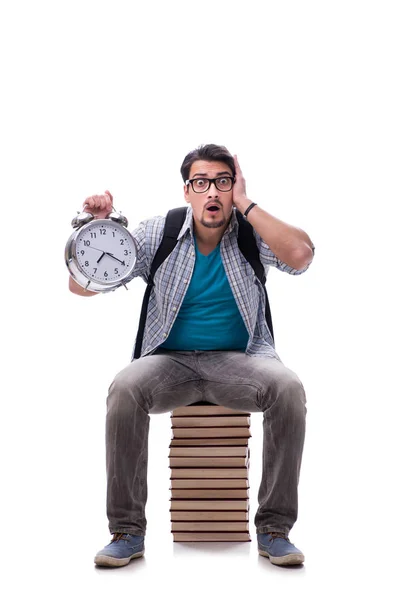 Young student sitting on top of book stack on white — Stock Photo, Image