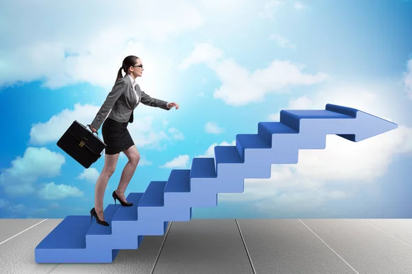 Businesswoman climbing career ladder in business concept — Stock Photo, Image