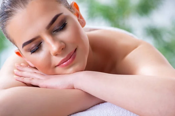 Woman during massage session in spa — Stock Photo, Image